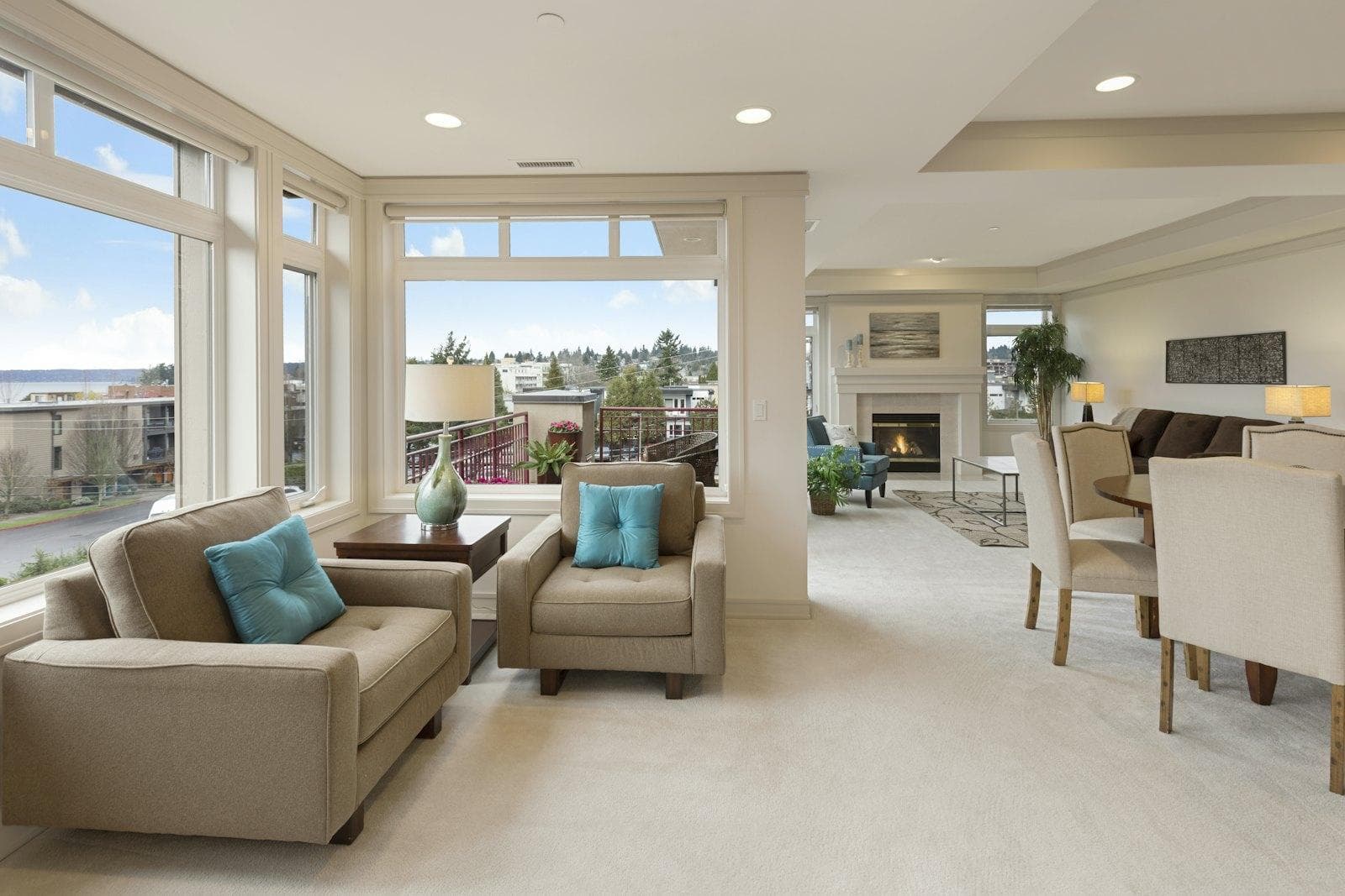 A bright living room with a sofa and a city view